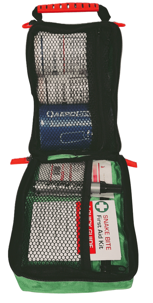 Open Regulator Snake and Spider Bite First Aid Kit showing bandages and first aid supplies organised in internal compartments.