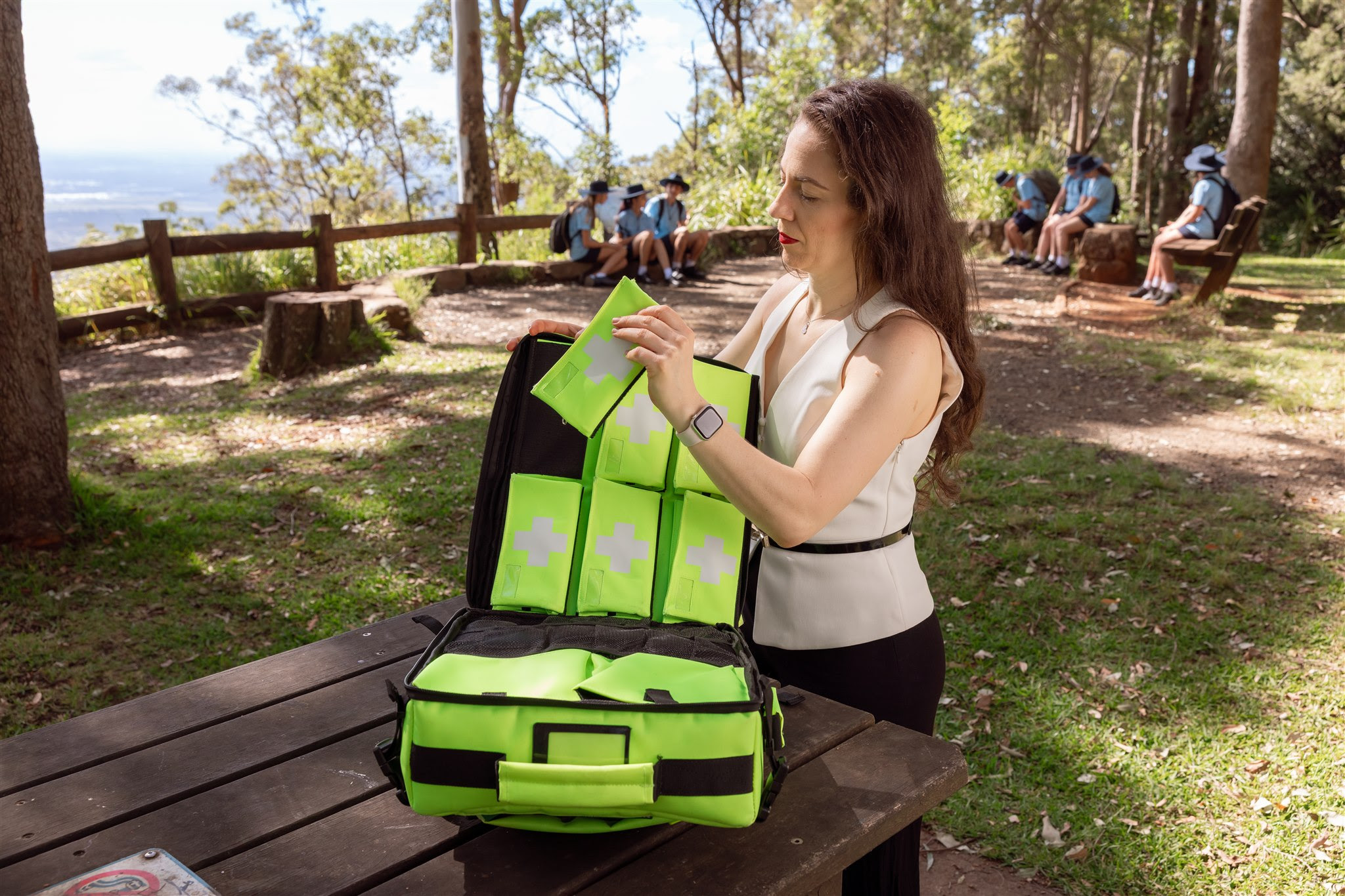 woman holding guardian backpack
